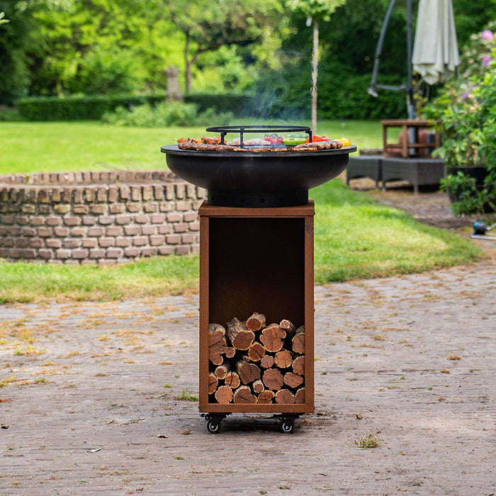 BBQ Vuurschaal Grill Blackline Cortenstaal 8mm Camarada 2.0 - Met pook en houtopslag Ø70cm