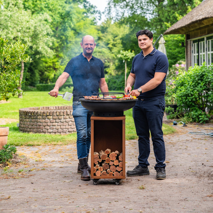 BBQ Vuurschaal Grill Blackline Cortenstaal 8mm Camarada 2.0 - Met pook en houtopslag Ø70cm