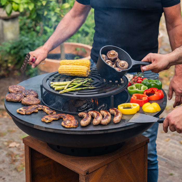 BBQ Vuurschaal Grill Blackline Cortenstaal 8mm Camarada 2.0 - Met pook en houtopslag Ø70cm