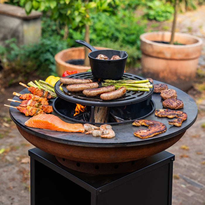 BBQ Vuurschaal Grill Cortenstaal Blackline 8mm Camarada 2.0 - Met pook en houtopslag Ø70cm